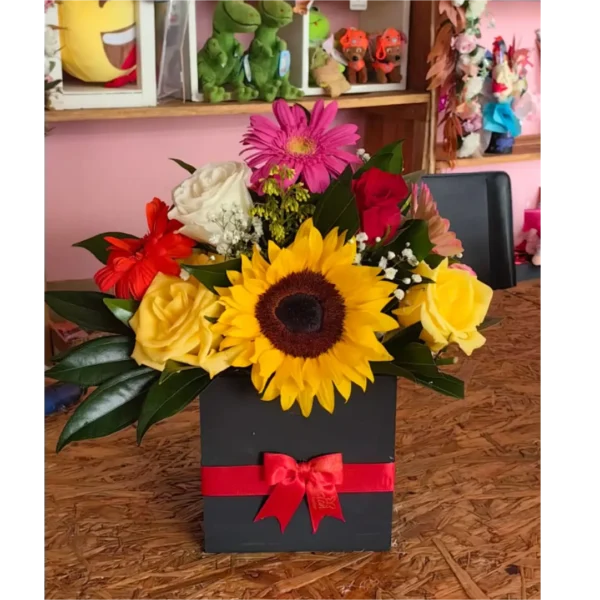 Caja con girasoles, rosas y gerberas de colores para Amor y Amistad en Pereira