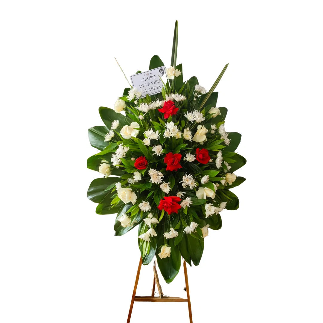 Arreglo floral de condolencias con flores blancas y rosas rojas